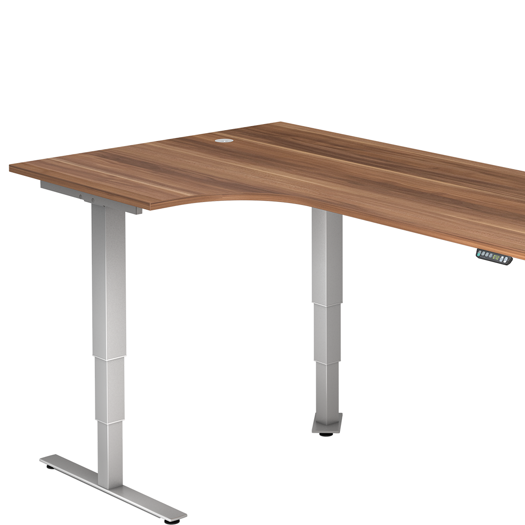 Ausschnitt eines Sitz-Steh-Eck-Schreibtisches mit hellen Metall-Beinen und Nussbaumdekor für die Platte